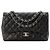 CHANEL - Borsa a tracolla Classique/Timeless Jumbo Chanel in pelle liscia nera Nero