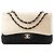 CHANEL - Bolsa de ombro Classic/Timeless Jumbo Chanel em couro caviar dourado e couro liso preto