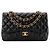 CHANEL - Borsa a tracolla Classic/Timeless Jumbo Chanel in pelle liscia nera Nero