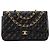 CHANEL - Borsa a tracolla Classique/Timeless Jumbo Chanel in pelle liscia nera Nero