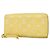 Louis Vuitton Monogram Empreinte Bicolor Zippy Wallet Yellow