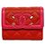Cartera tri-fold Chanel en piel de becerro granulada Roja