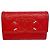 Cartera tri-fold de Chanel en piel de becerro granulada roja