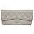 Cartera larga de piel de cordero gris de Chanel Castaño