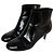 Botines de puntera reforzada en piel charol negra Chanel Negro