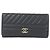 Cartera bi-fold Chanel 82399 de cuero negro