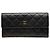 Chanel CC Long Wallet mit Klappe aus schwarzem gestepptem Kaviarleder