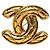 Broche acolchado Chanel CC chapado en oro Dorado