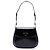Prada Cleo Schultertasche mit Klappe aus Spazzolato-Leder in Schwarz, Medium