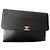 Chanel Clutch XL Couro Matelassê Preto