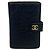 Cartera Chanel Camellia de piel de cordero Negro