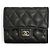 Timeless Portafoglio Tri-Fold Chanel in pelle di vitello granulata nera Nero