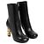 Bottines Givenchy G Cube en cuir noir avec talon logo doré