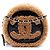 Clutch rotonda Chanel in pelle di pecora lucida stropicciata con bordo in shearling nero e catena