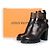 Louis Vuitton, botas de cano curto com fivela star trail Marrom Preto - vista 2