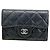 Tarjetero Chanel negro en piel de becerro granulada