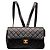 Chanel Medium Quilted Flap Rucksack aus schwarzem Lammleder