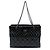 Bolso Chanel Reissue 2.55 de charol acolchado negro