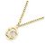 Collana con pendente Chanel in metallo dorato e strass D'oro