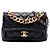 Bolsa Chanel Small Quilted em pele de cordeiro preta com corrente Preto