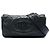 Chanel Black Quilted Aged Calfskin Oval Logo Flap Schwarz