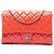 Clutch de solapa acolchada de charol rosa Chanel CC con cadena