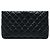 Pochette Chanel en agneau matelassé noir avec fermoir kiss lock