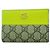 Portafoglio bi-fold Gucci GG Marmont Supreme Marrone Verde