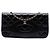Chanel Clutch 31 in vitello lucido stropicciato nero con catena