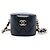 Chanel Mini Round Vanity Case aus schwarzem gestepptem Lammleder mit Kette