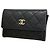 Tarjetero Chanel de piel de becerro granulada negra