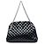 Borsa Bowling Just Mademoiselle Chanel in vernice matelassé nera Large