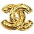 Spilla trapuntata Chanel Gold CC placcata oro D'oro