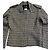 Timeless Giacca Chanel in tweed bianco e nero