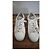 Baskets Michael Kors en cuir blanc et paillettes dorées - vue 6