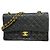 Borsa a tracolla Chanel Matelassé in pelle di agnello nera