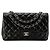 CHANEL - Borsa a tracolla Classique/Timeless Jumbo Chanel in pelle liscia nera Nero