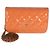 Portafoglio Chanel Classic Wallet On Chain in vernice matelassé arancione scuro
