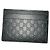 Gucci GG Tarjetero de cuero negro
