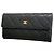 Cartera larga Chanel Matelassé en piel caviar negra