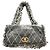 Chanel Borsa a patta trapuntata in pelle nera e tweed