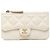 Portacarte con zip e patta Chanel White CC Quilted Caviar