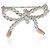 Broche de lazo Tiffany & Co. en oro amarillo y plata de ley