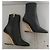 Fendi black leather ankle boots with gold heel. - view 17