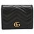 Cartera bi-fold Gucci en cuero negro