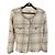 Chaqueta Chanel de tweed crema
