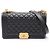 Borsa a tracolla Chanel Boy in pelle di vitello martellata nera