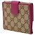 Cartera bi-fold Gucci GG Canvas con placa de metal - vista 2