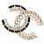 Broche Chanel Champagne Gold con pedrería