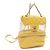 Mochila Chanel de cuero y vinilo amarillo